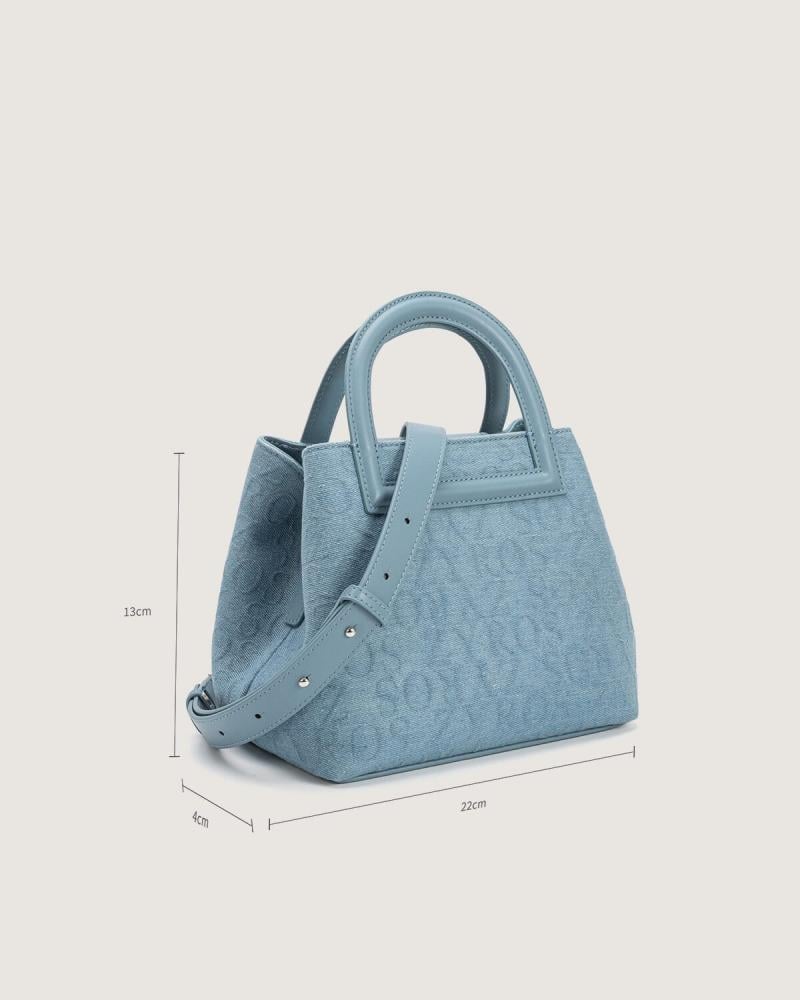 شنطة نسائية من القماش الجينز بلون أزرق فاتح