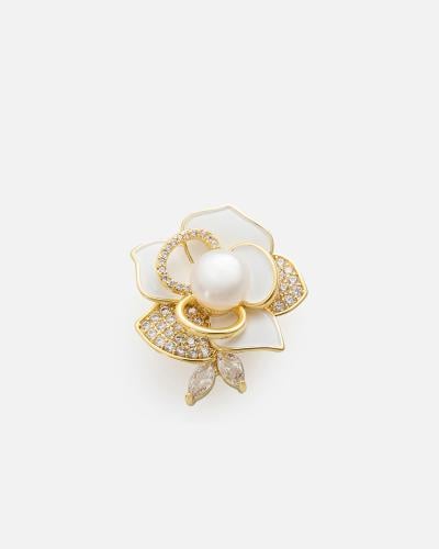 Women's brooch with a unique design in gold color