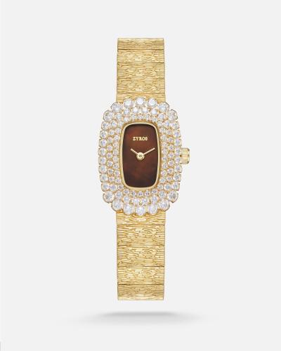A women's watch with a striking design in gold
