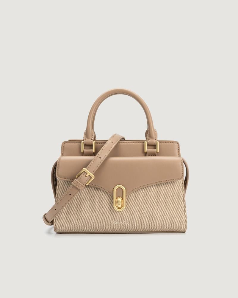 Women's beige leather handbag with a classic design
