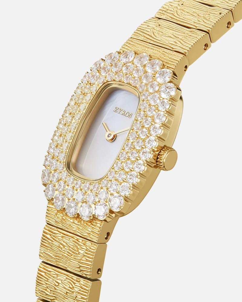 A women's watch with a striking design in gold