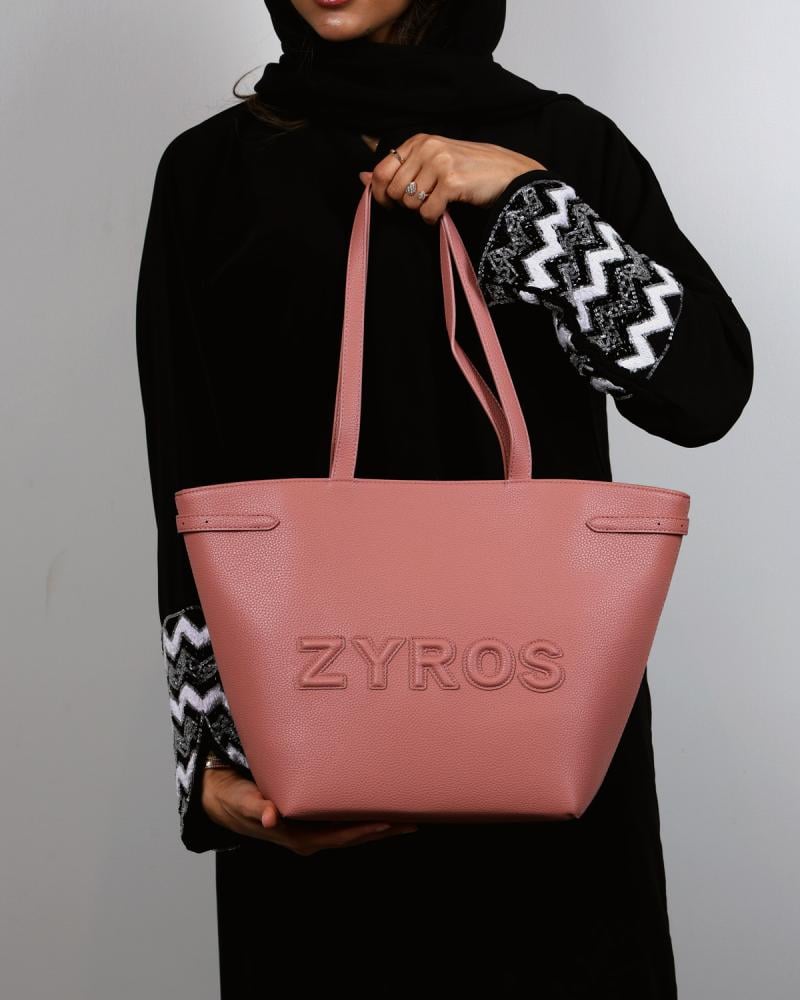 A spacious bag with a practical design in pink