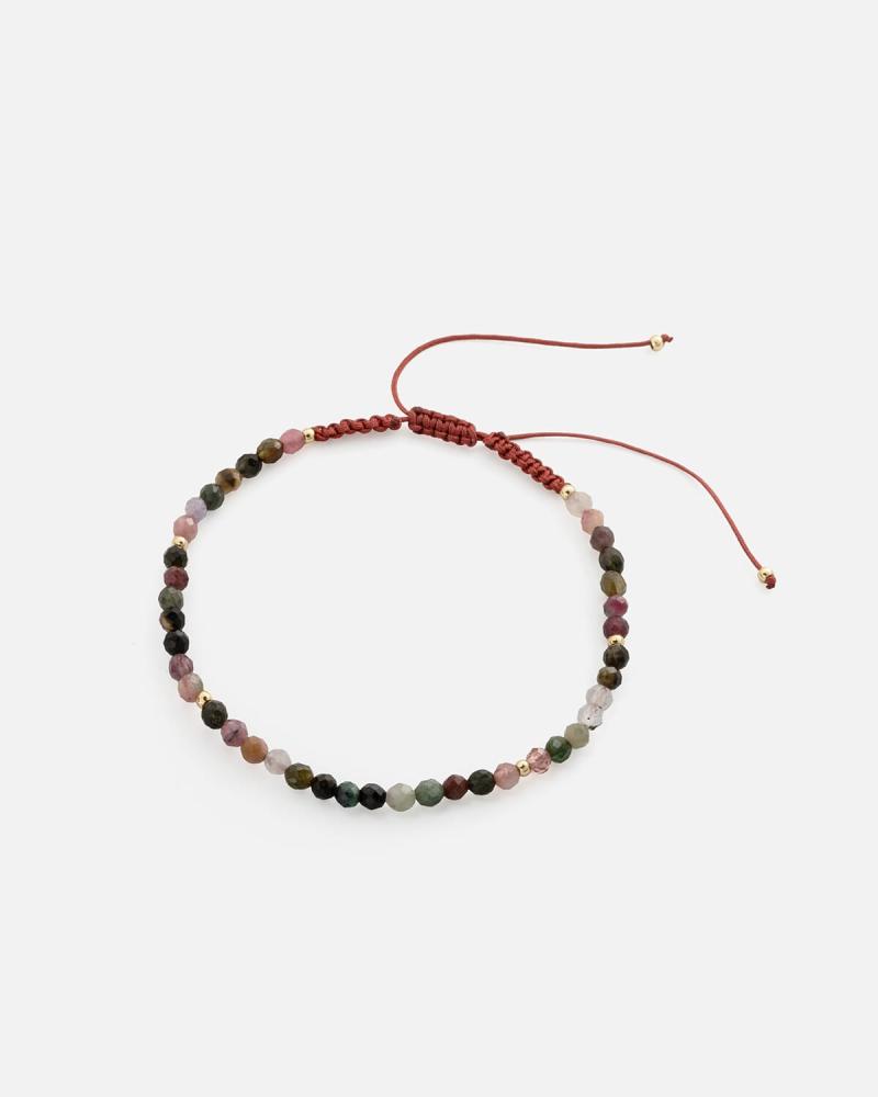 Women's bracelet with colorful beads and woven threads