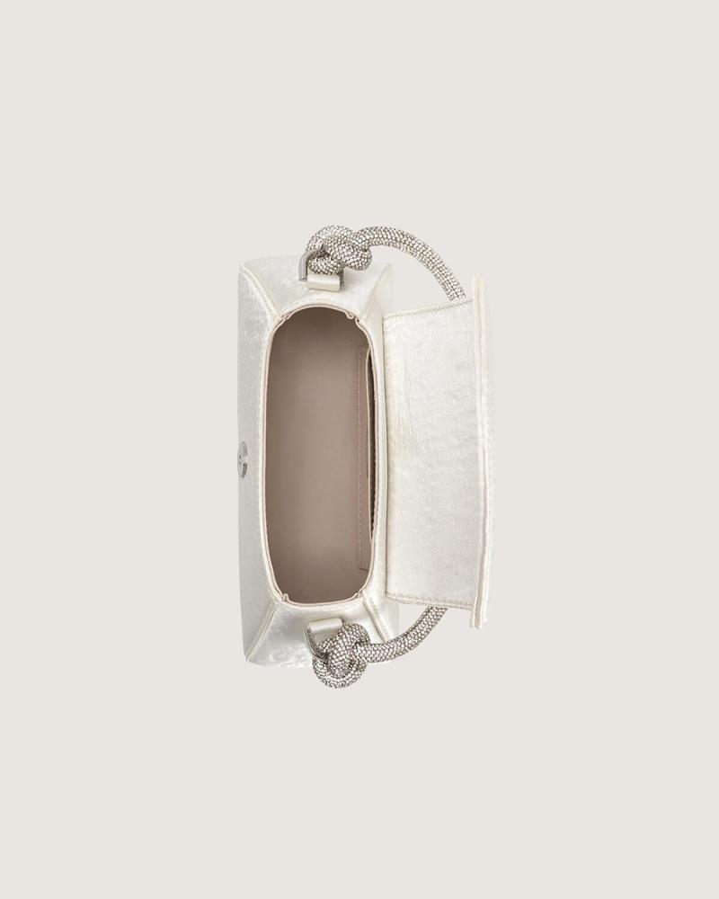 A medium-sized white women's handbag suitable for your special occasions