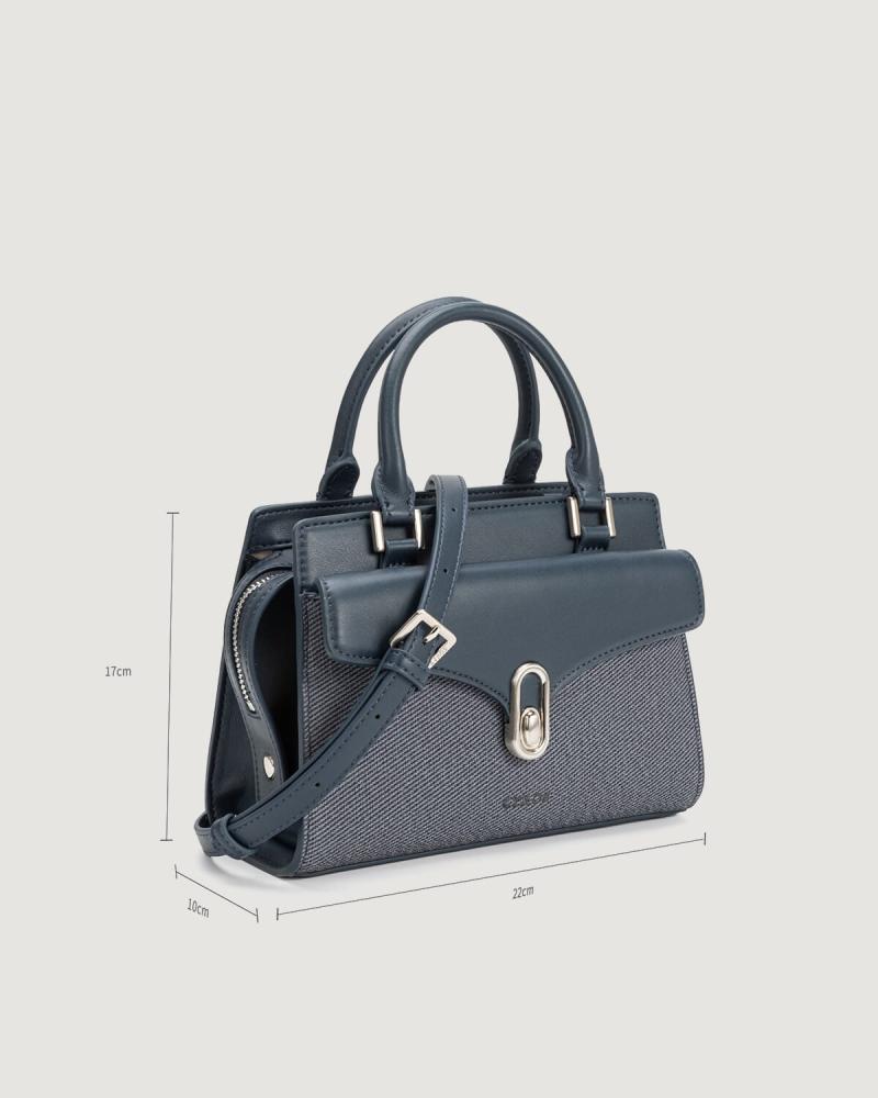 Women's leather handbag in blue with a classic design