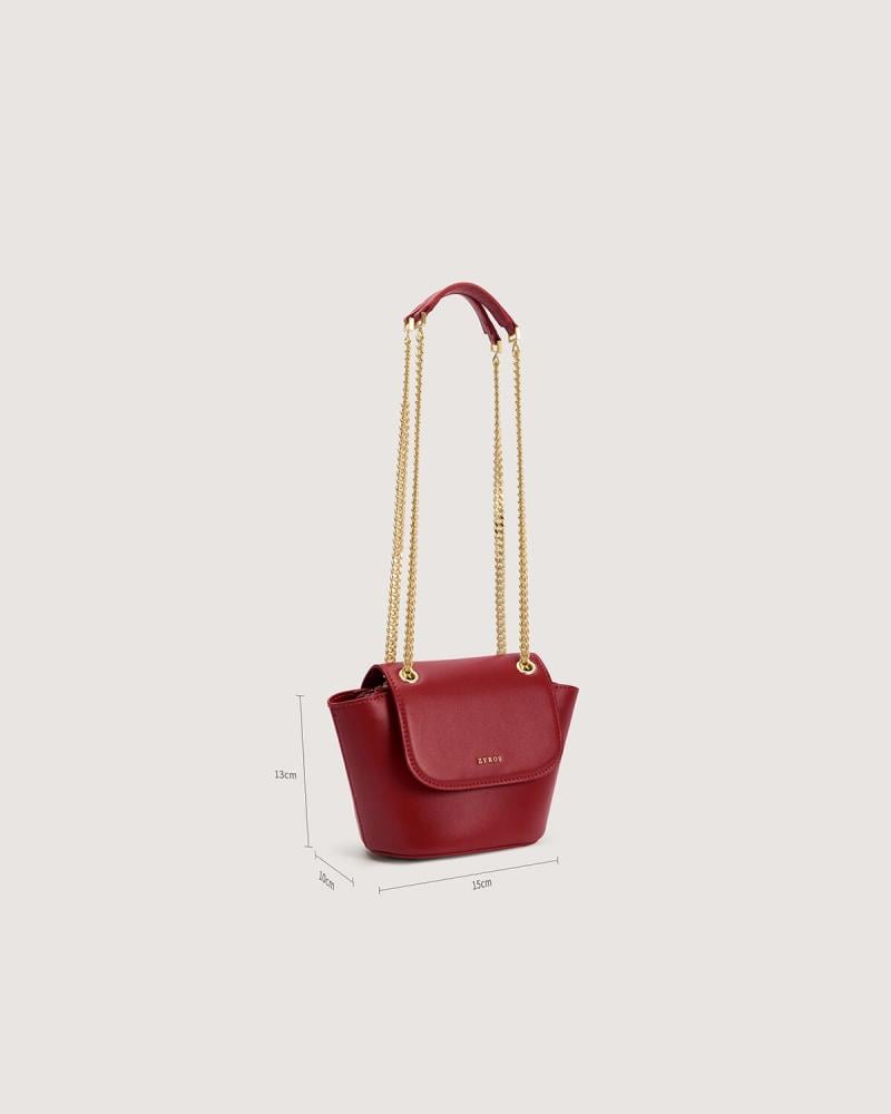 Small women's handbag in a burgundy color