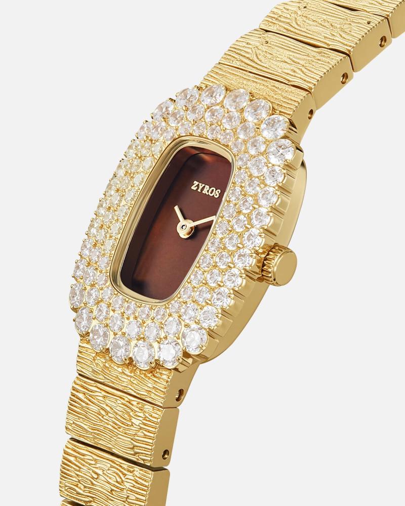 A women's watch with a striking design in gold