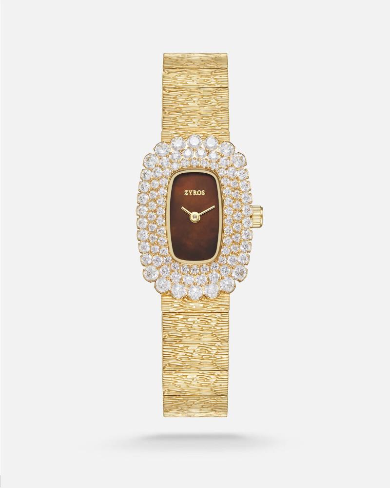 A women's watch with a striking design in gold