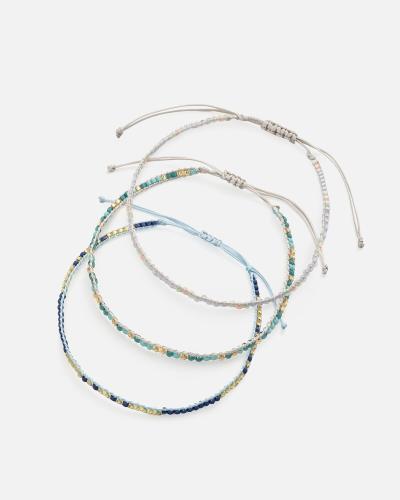 Bracelets made of threads and beads in shades of gray and blue