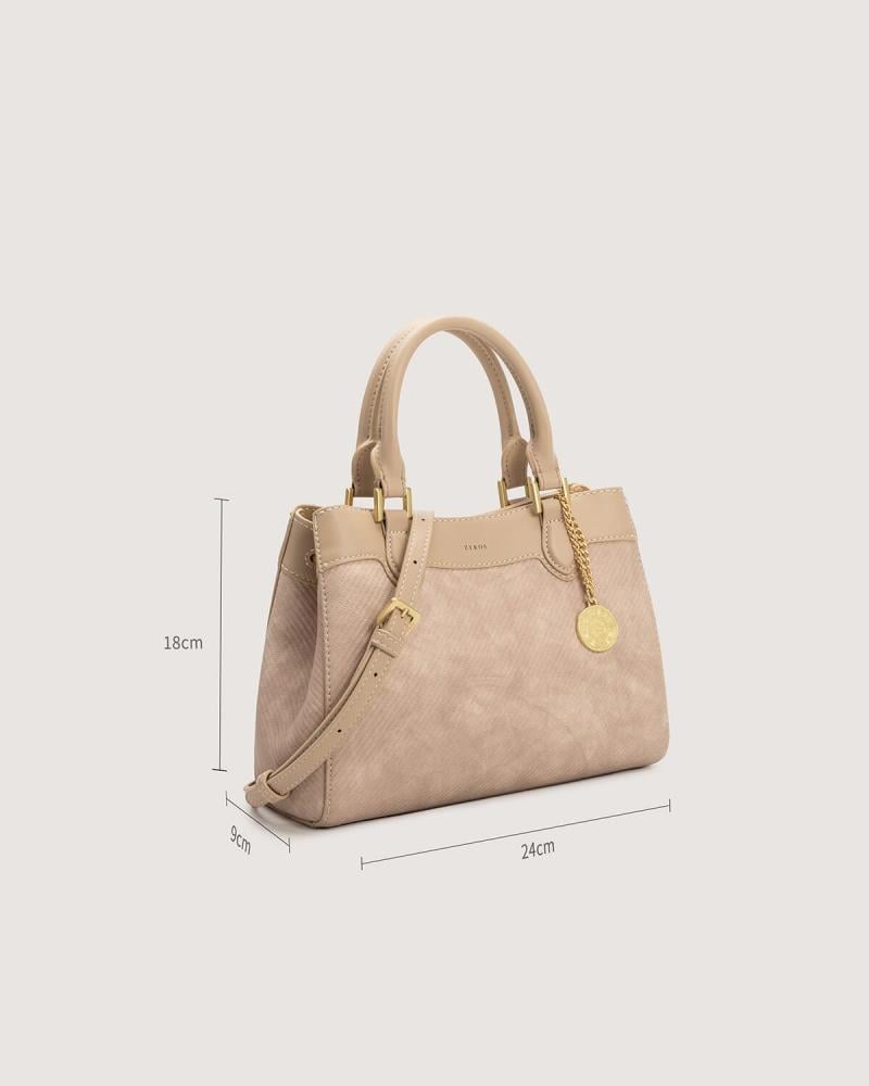Women's pink leather handbag