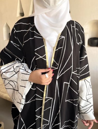 عباية مميزة صيفيه بارده القماش لنن سكري مع اسود