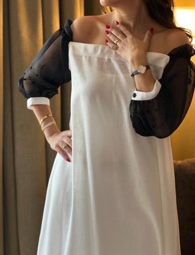 جلابية عملية القماش لنن سكري واسود وعلى الأكمام شك اسود