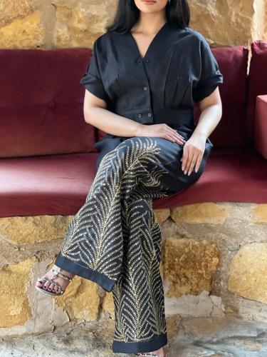 طقم لنن اسود و على البنطلون تطريز و شك ذهبي