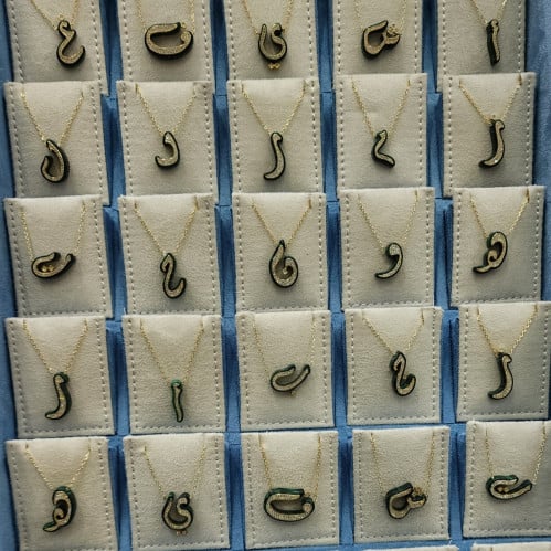 حرف ريزن فضة صافي عيار 925 مطلي ذهب