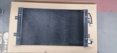 #12298C لديتر مكيف جمس استرو وسفاري / CONDENSER GM ASTRO SAFARI 95--05