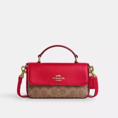 Mini Josie Top Handle Bag In Signature Canvas