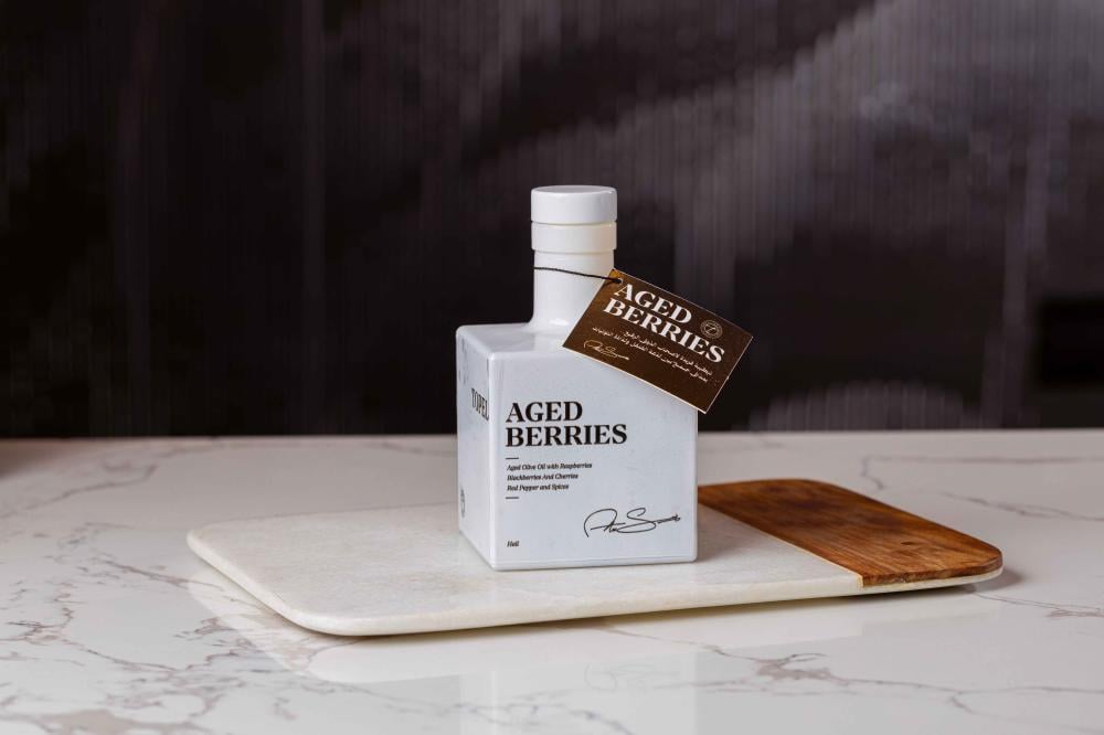 معتق زيت الزيتون بالتوتيات