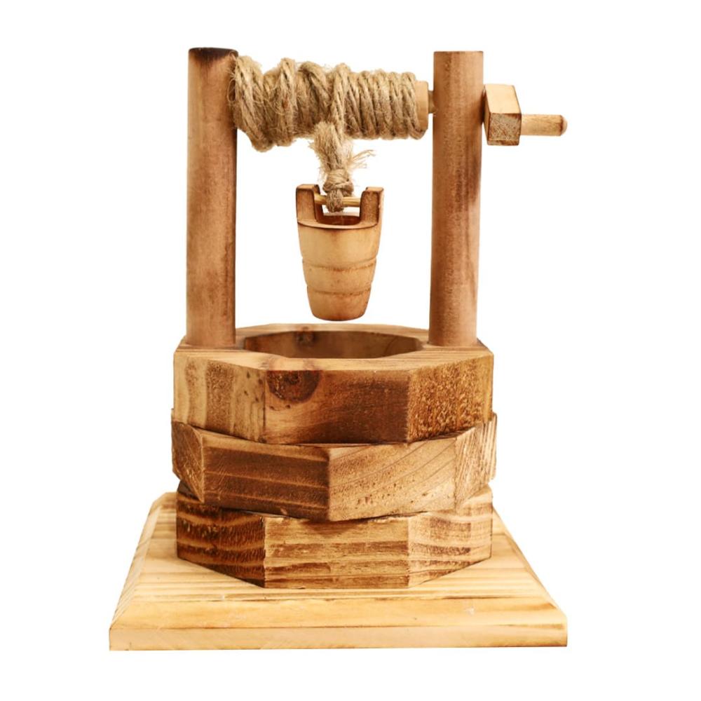 قطعة ديكور منزل بتصميم بئر خشبي