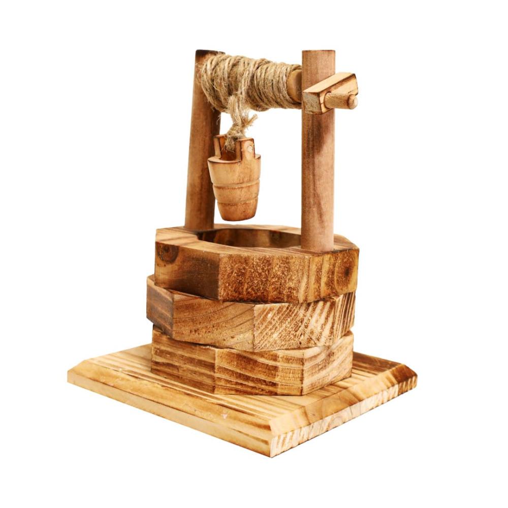 قطعة ديكور منزل بتصميم بئر خشبي