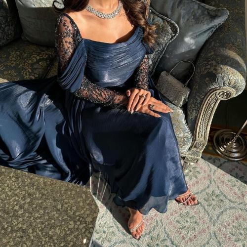 فستان سهرة خامة كرنكل فرنسي مع اكمام كلفه مطرزه