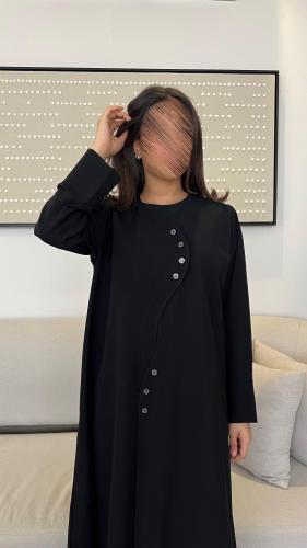 عباية أسود بأزرار امامية قماش اندونيسي.