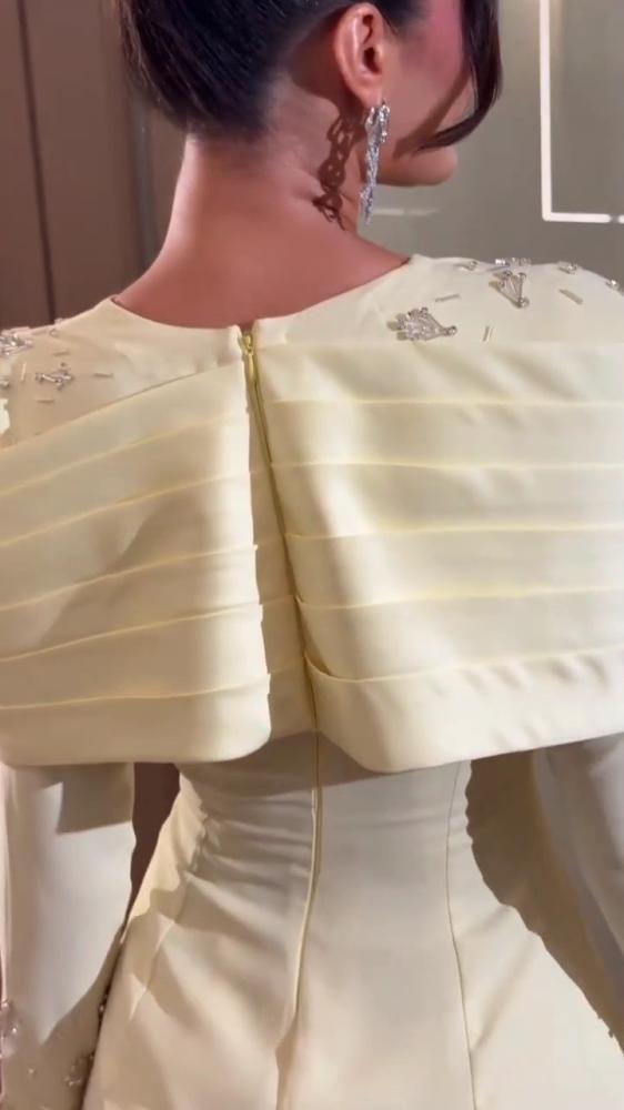 فستان سهره اصفر فاتح  الخامه باربي تطريز يدوي راقي بجوده و اتقان على الاكمام و الاكتاف يعطيك اطلاله مميزه من متجر جوهره