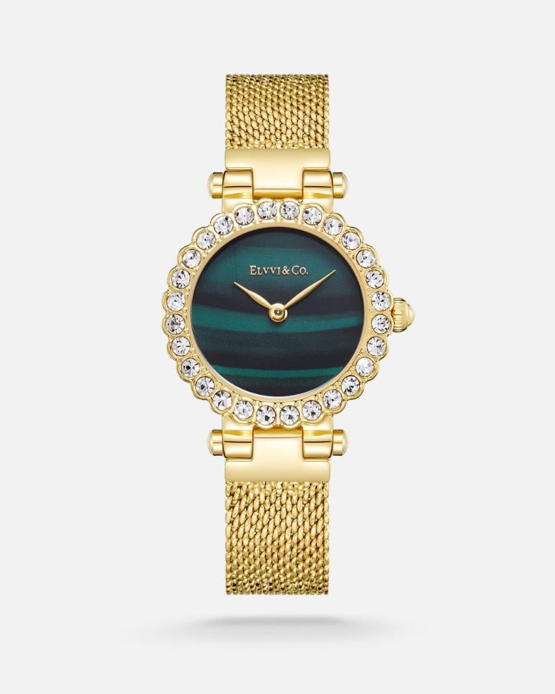 ساعة نسائية باللون الذهبي وميناء أخضر