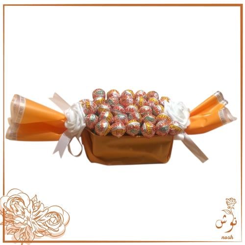 مصاصات العيد باللون البرتقالي