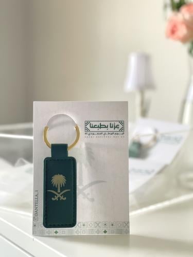 ميدالية مع كرت لليوم الوطني السعودي