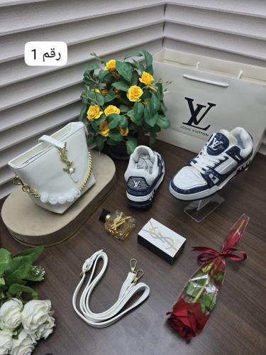 طقم شنطة ماركة افسان لوران خامة جلد