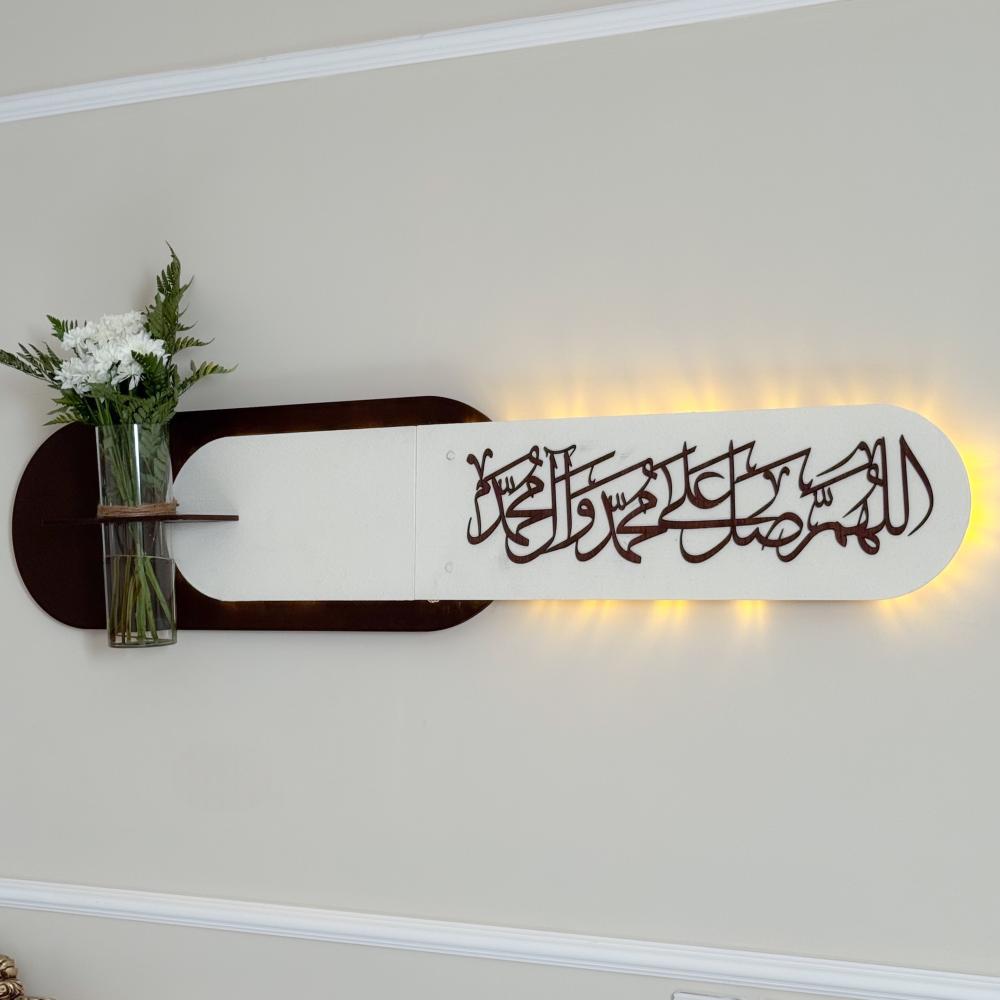 ديكور جداري وفازة + عبارة مميزة