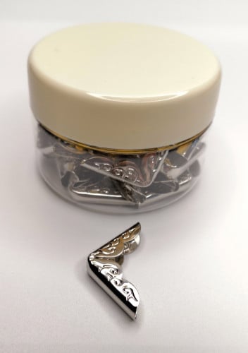 زوايا البوم فضي 40 حبة 2 سم