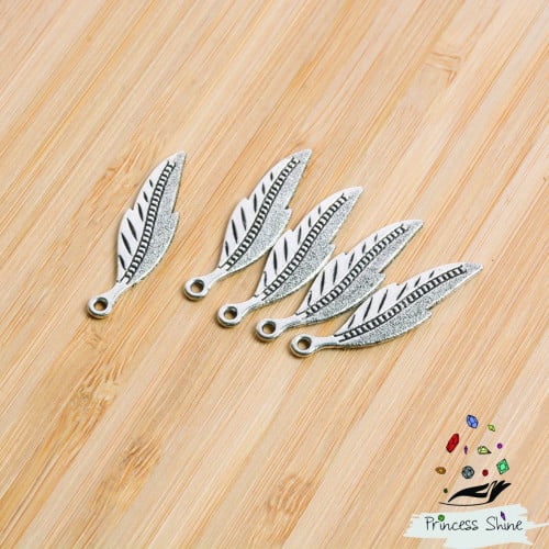 196 - تعليقة ريش فضي