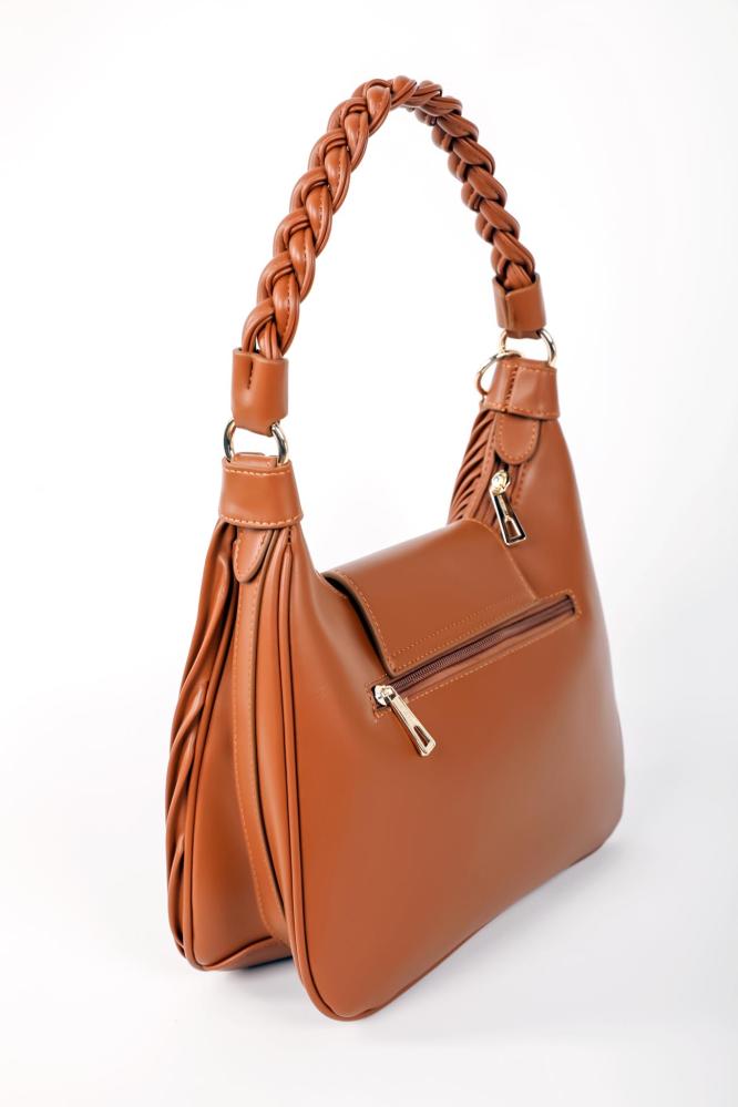 A bag with a small wallet in camel color with a distinctive and modern design made of luxurious leather