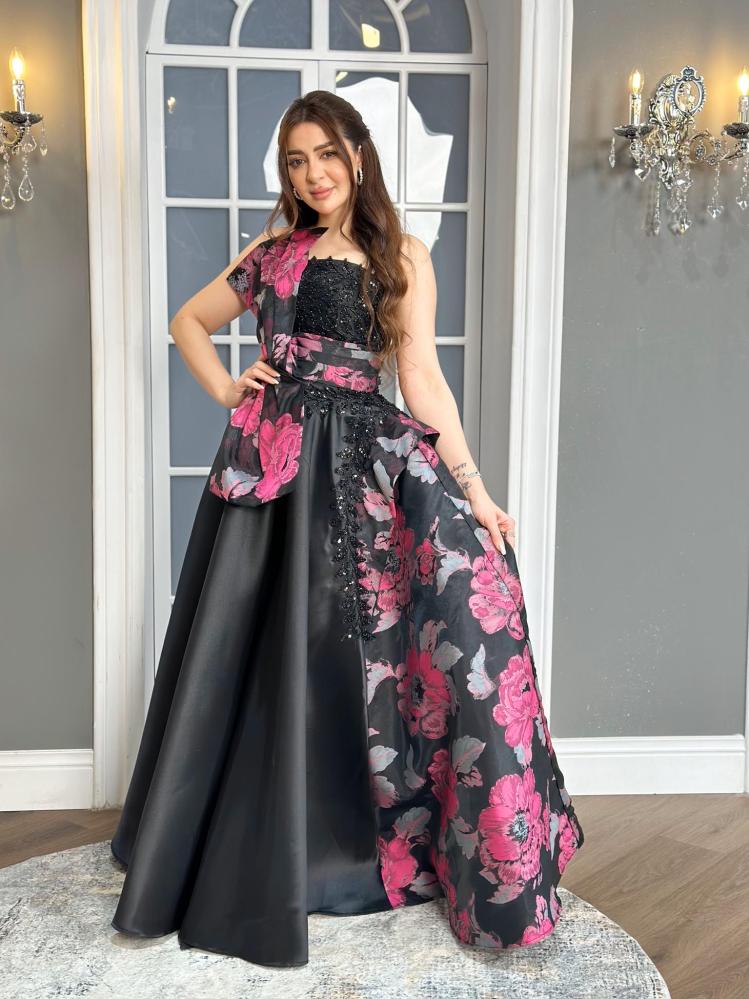 Evening dress in taffeta fabric with floral jacquard and embellished with embroidery on the chest