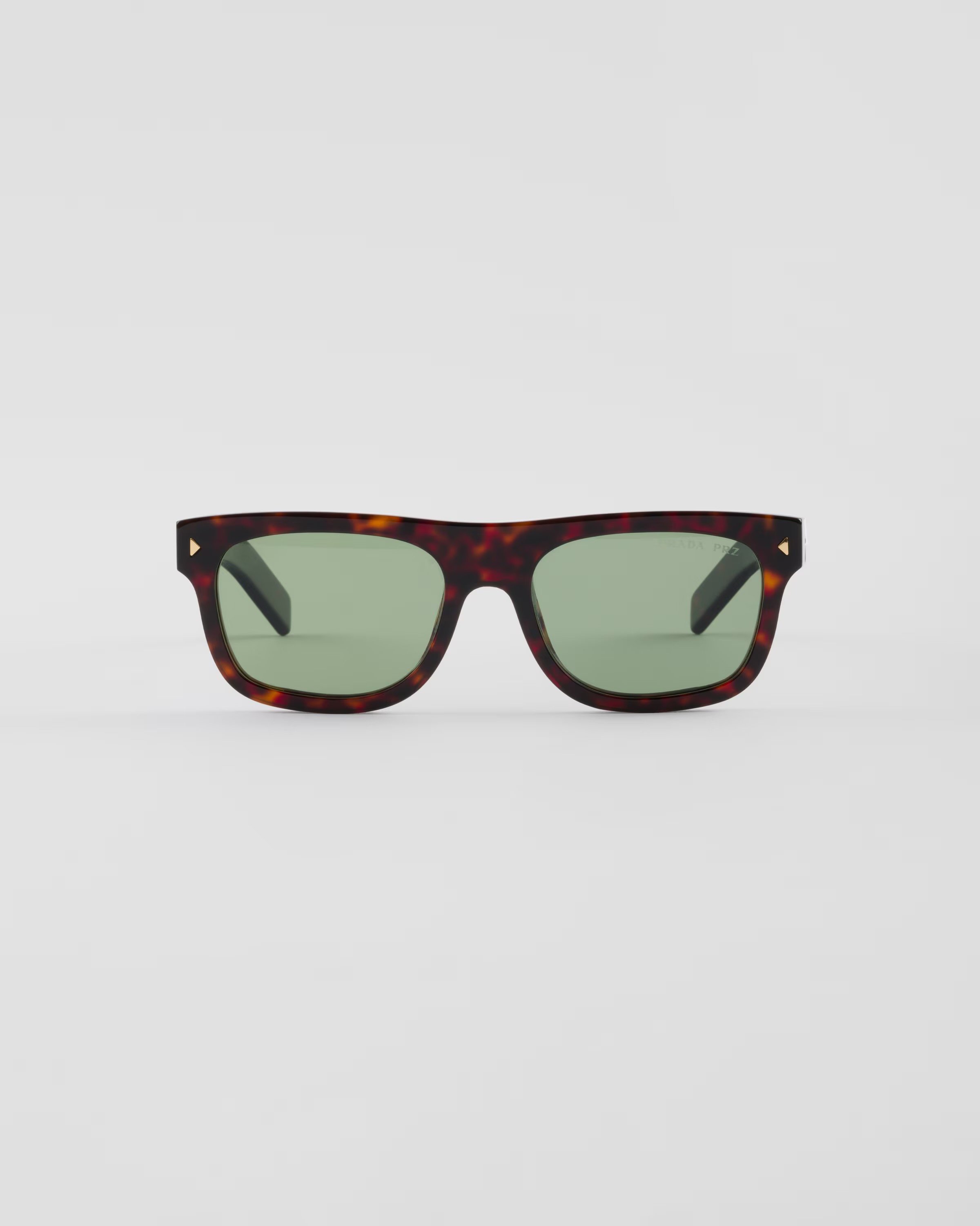 PRADA Sunglasses with the iconic metal plaque