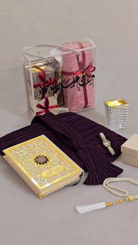 بكس صلاة مع سجادة ومصحف وشراشف الصلاه بالاسم