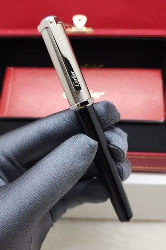 قلم كارتير Cartier فضي مع اسود متجر تدفق