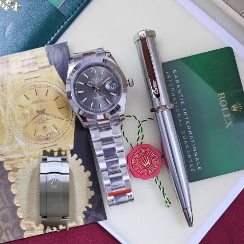 طقم ساعه رولكس رمادي مع قلم كارتير نحيف فضي