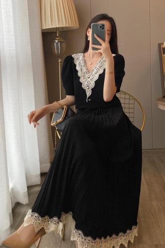 طقم أسود بلوزه قصية مع تنورة بتصميم أنيق