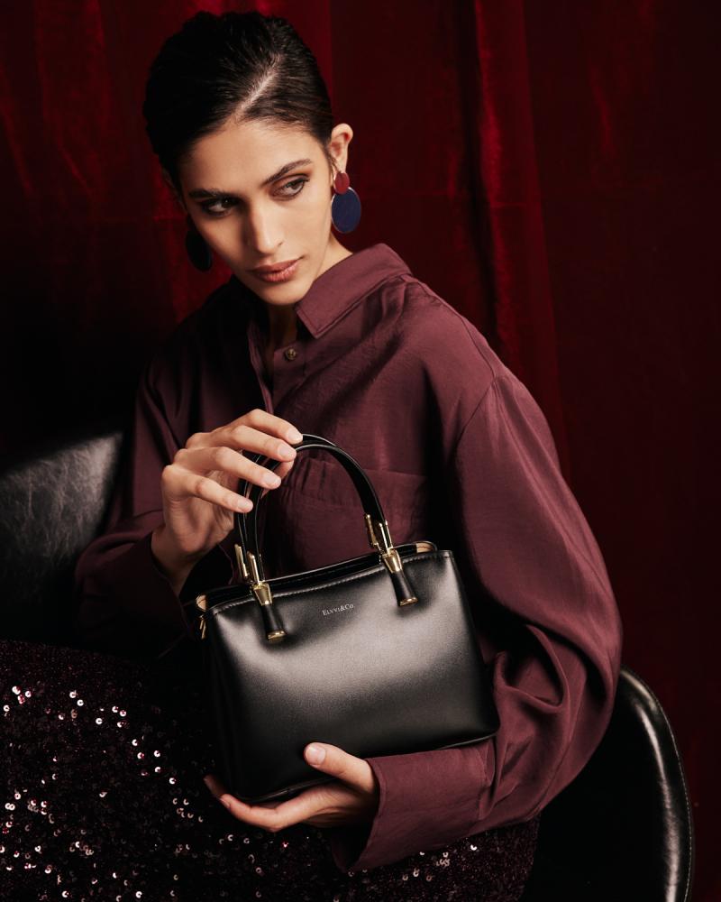 Women's black leather handbag