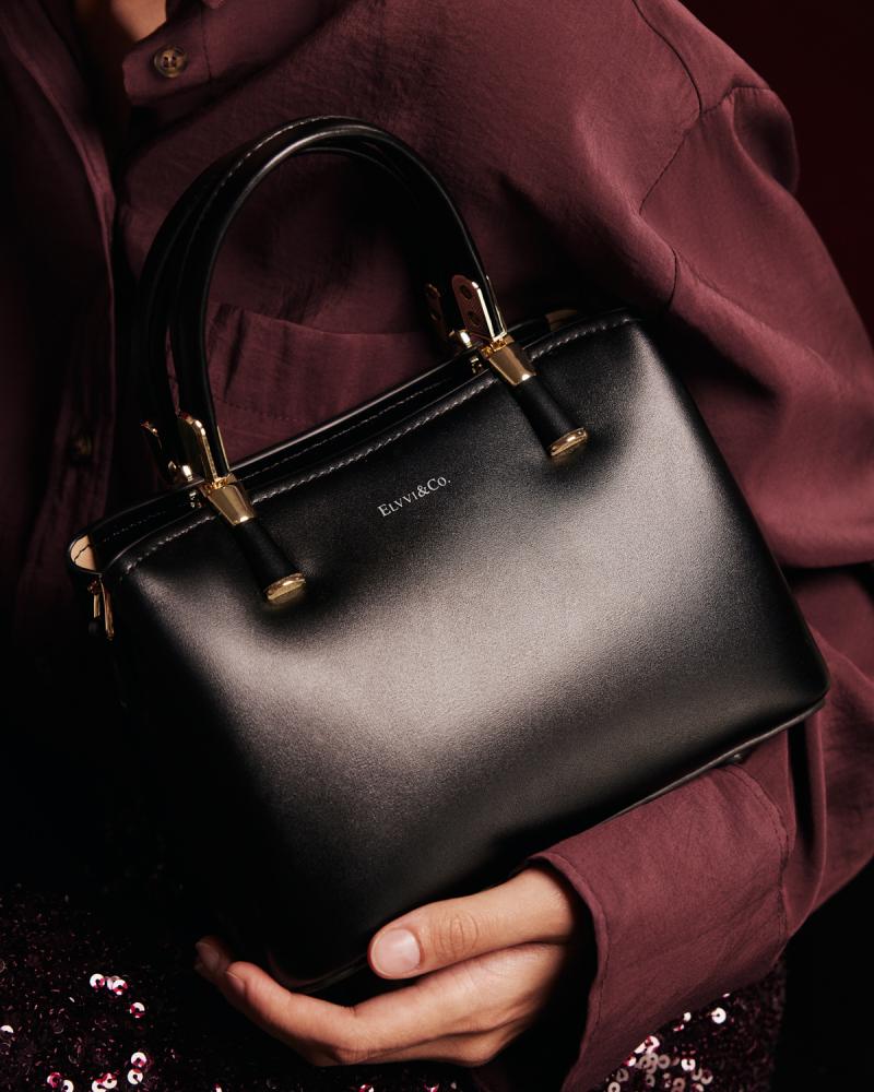 Women's black leather handbag