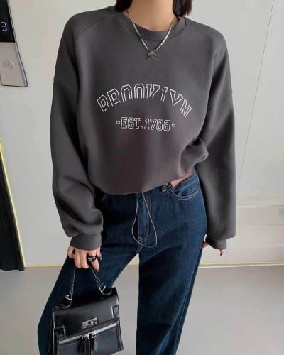 Women's hoodie with a stylish design in gray
