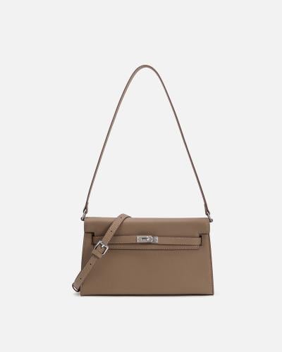 Women's bag with an elegant design in brown
