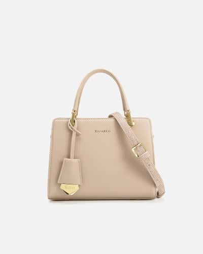 Elegant women's handbag in beige leather