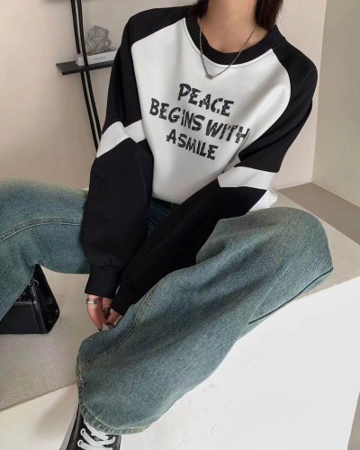Women's hoodie with a stylish design in black and white