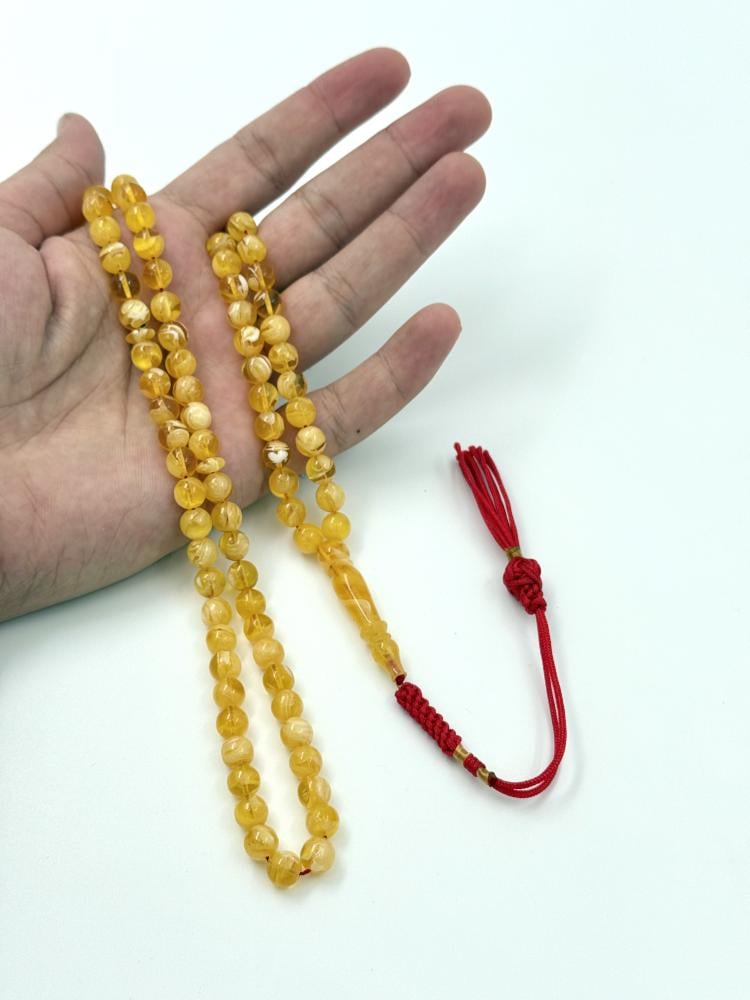 مسباح مستكة شبيه الكهرمان