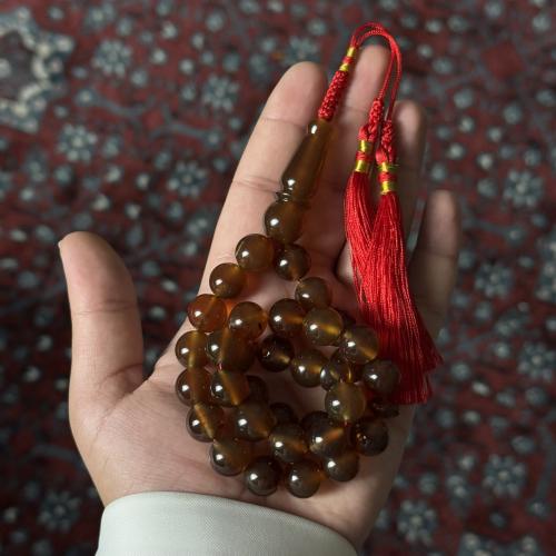 مسباح كهرمان شفاف