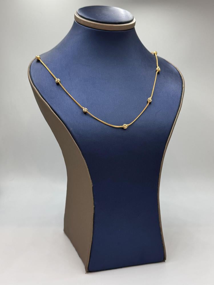 عقد كرات ذهب عيار 21