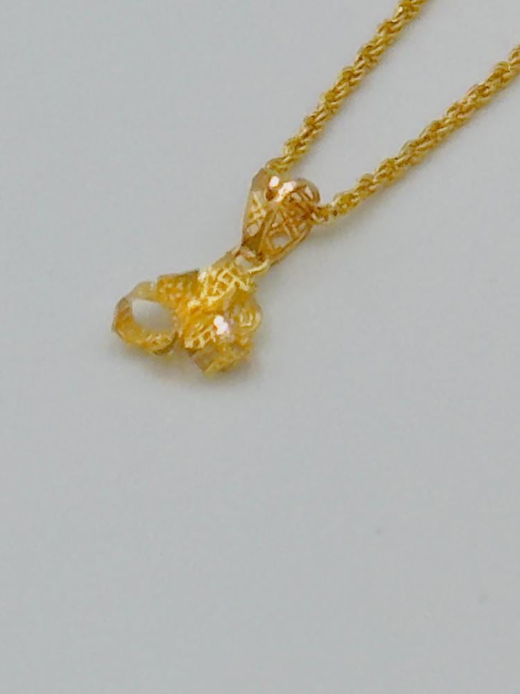 عقد وردة ذهب عيار 21 - مجوهرات قصر المدينة للذهب - الدمام